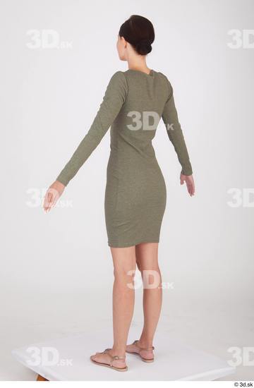 Vanessa Angel A poses dressed green long sleeve dress standing whole body  jpg