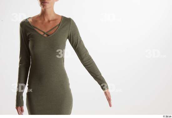 Vanessa Angel  arm casual dressed flexing front view green long sleeve dress  jpg