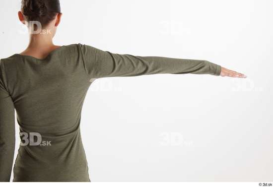 Vanessa Angel  arm back view casual dressed flexing green long sleeve dress  jpg