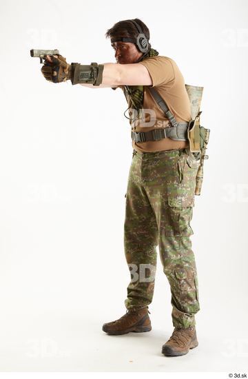 Weapons-Pistol Man Pose with pistol White Uniform Athletic Studio photo references