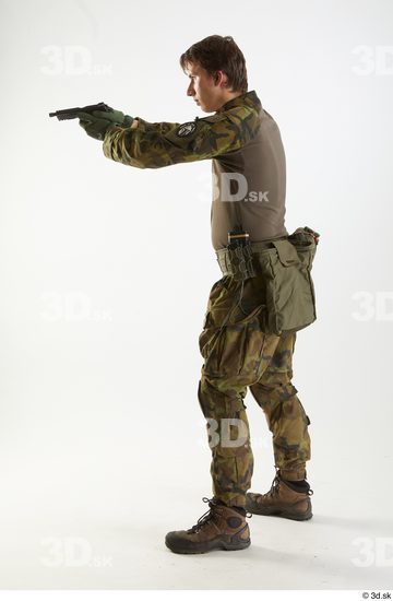 Whole Body Weapons-Pistol Man Pose with pistol White Uniform Athletic Studio photo references