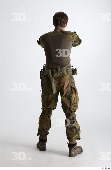 Whole Body Weapons-Pistol Man Pose with pistol White Uniform Athletic Studio photo references