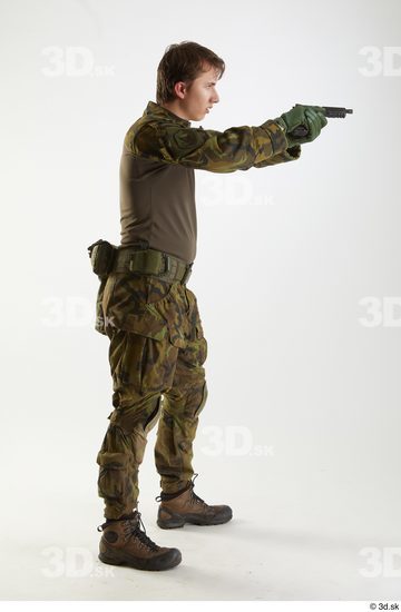 Whole Body Weapons-Pistol Man Pose with pistol White Uniform Athletic Studio photo references