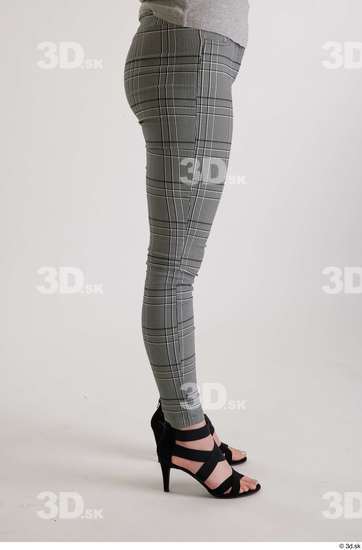 Olivia Sparkle  black high heels sandals casual dressed flexing grey checkered trousers leg side view  jpg