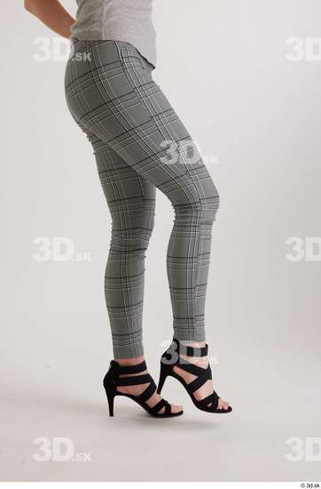 Olivia Sparkle  black high heels sandals casual dressed flexing grey checkered trousers leg side view  jpg