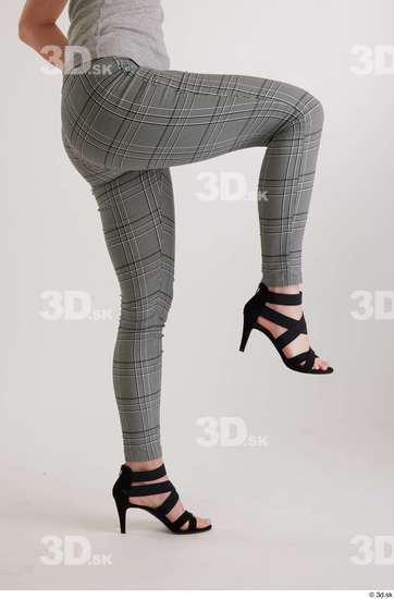 Olivia Sparkle  black high heels sandals casual dressed flexing grey checkered trousers leg side view  jpg