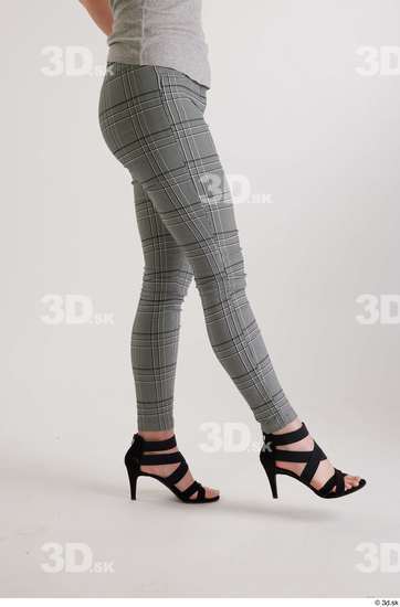 Olivia Sparkle  black high heels sandals casual dressed flexing grey checkered trousers leg side view  jpg