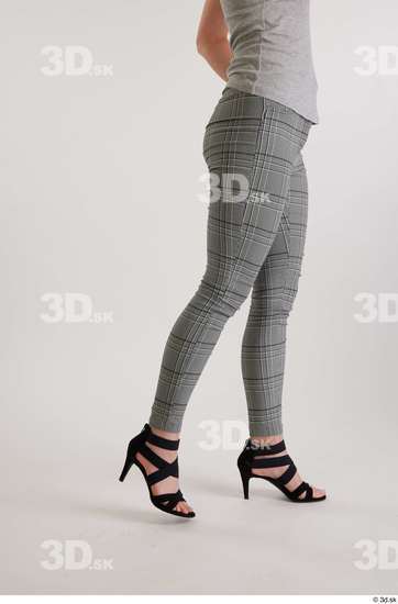 Olivia Sparkle  black high heels sandals casual dressed flexing grey checkered trousers leg side view  jpg