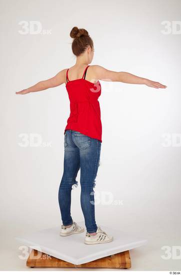 Olivia Sparkle blue jeans with holes casual dressed standing t poses white sneakers whole body  jpg