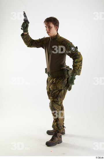 Whole Body Weapons-Pistol Man Pose with pistol White Uniform Athletic Studio photo references