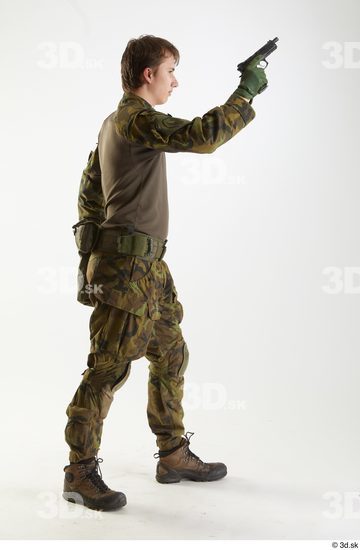 Whole Body Weapons-Pistol Man Pose with pistol White Uniform Athletic Studio photo references