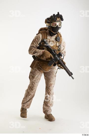  Casey Schneider Paratrooper in Desert Marpat with Gun standing walking whole body 0008.jpg