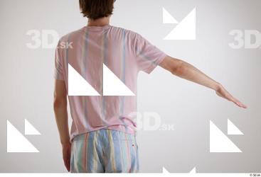 Tony  1 arm back view casual dressed flexing striped&hellip;