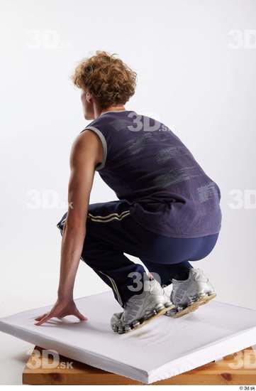 Whole Body Man White Sports Pants Slim Kneeling Top Studio photo references