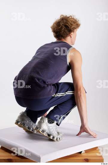 Whole Body Man White Sports Pants Slim Kneeling Top Studio photo references