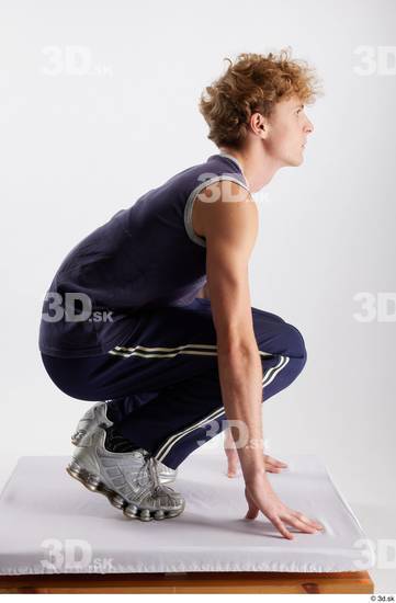 Whole Body Man White Sports Pants Slim Kneeling Top Studio photo references