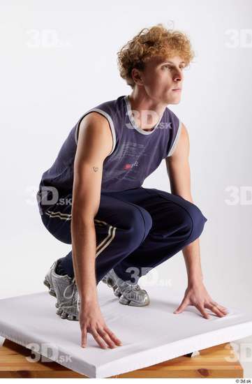 Whole Body Man White Sports Pants Slim Kneeling Top Studio photo references