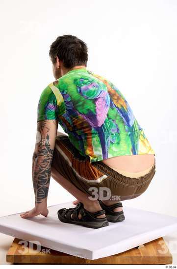 Whole Body Man White Casual Shorts Average Parrot Kneeling Studio photo references