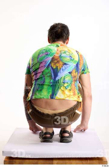 Whole Body Man White Casual Shorts Average Parrot Kneeling Studio photo references