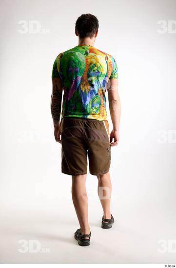 Whole Body Back Man White Casual Shorts Average Parrot Walking Studio photo references