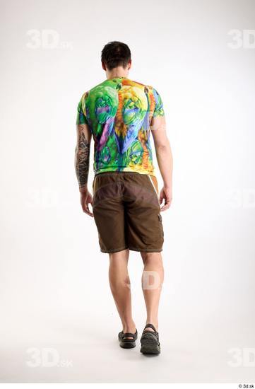 Whole Body Back Man White Casual Shorts Average Parrot Walking Studio photo references