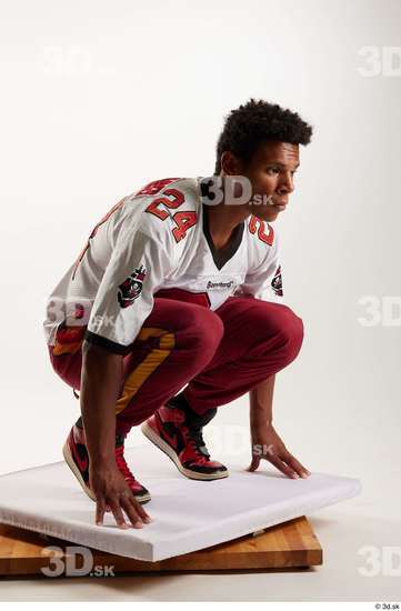 Man Black Sports Pants Athletic Kneeling Studio photo references