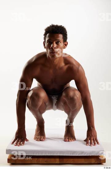 Whole Body Man Black Swimsuit Athletic Kneeling Studio photo references