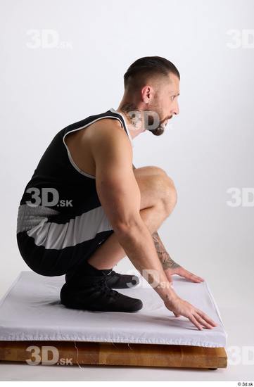 Whole Body Man White Sports Shorts Slim Athletic Kneeling Top Studio photo references