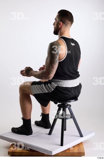 Whole Body Man White Sports Shorts Slim Athletic Sitting Top Studio photo references