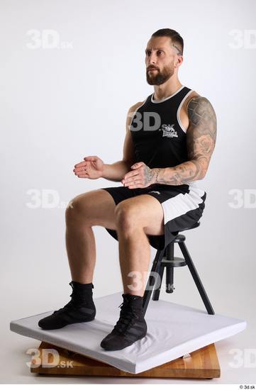 Whole Body Man White Sports Shorts Slim Athletic Sitting Top Studio photo references