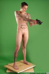 Whole Body Man Pose with pistol White Tattoo Nude Underweight Male Studio Poses